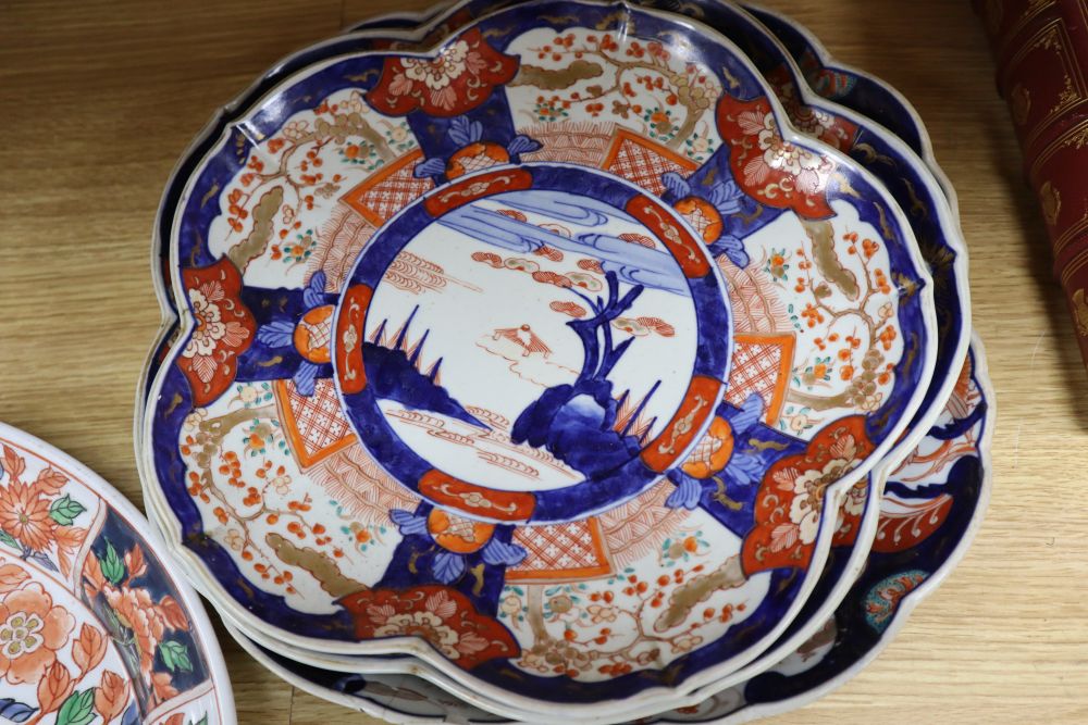 A Japanese Imari oval dish with six-character mark to base and six other items of Japanese Imari